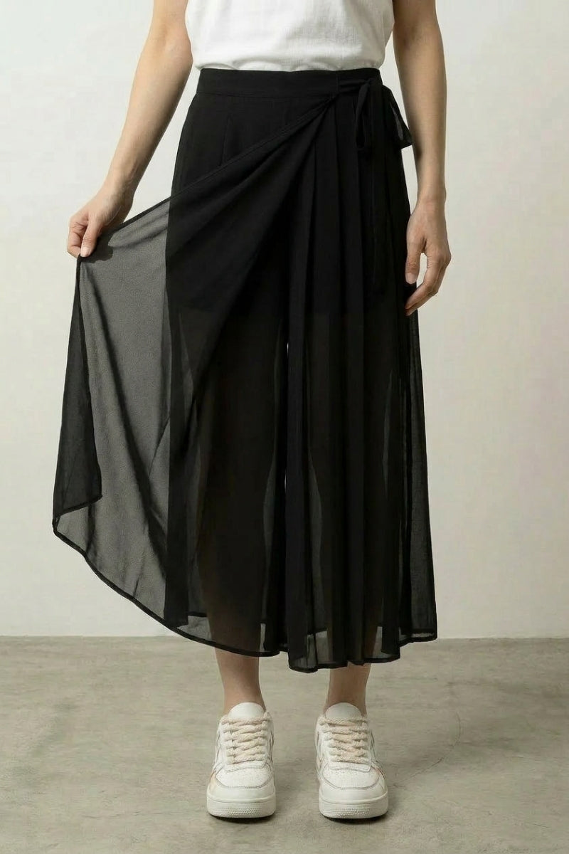 Black pleated hakama skirt for women in chiffon overlay with side bow tie at the waist