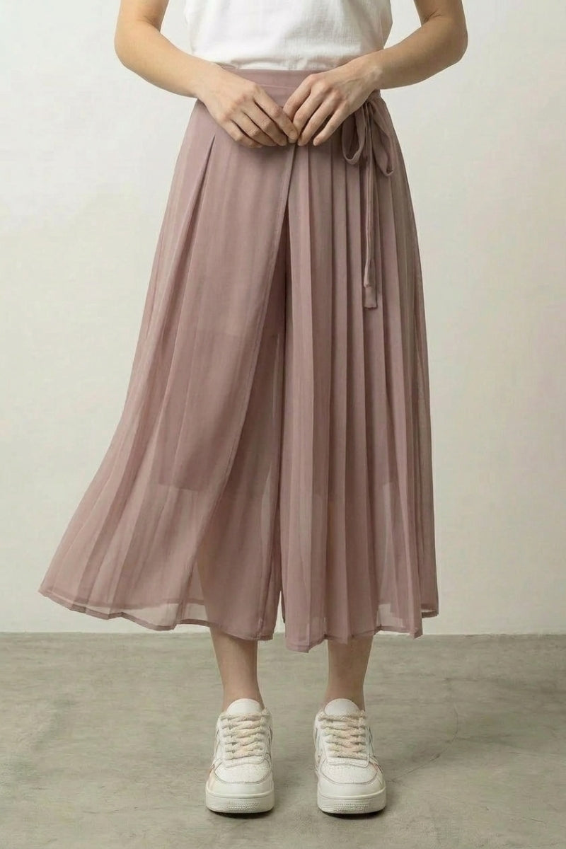 Pink pleated hakama skirt for women in chiffon overlay with side bow tie at the waist