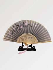 Antique fan in Japanese style in elegant and vintage fabric