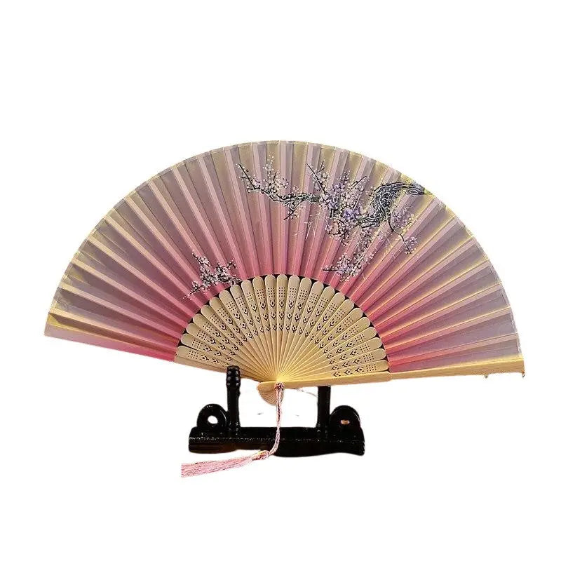 Back view of japanese folding fan with oni motif