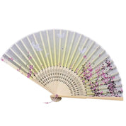 Back view of yellow japanese folding fan with Geisha motif