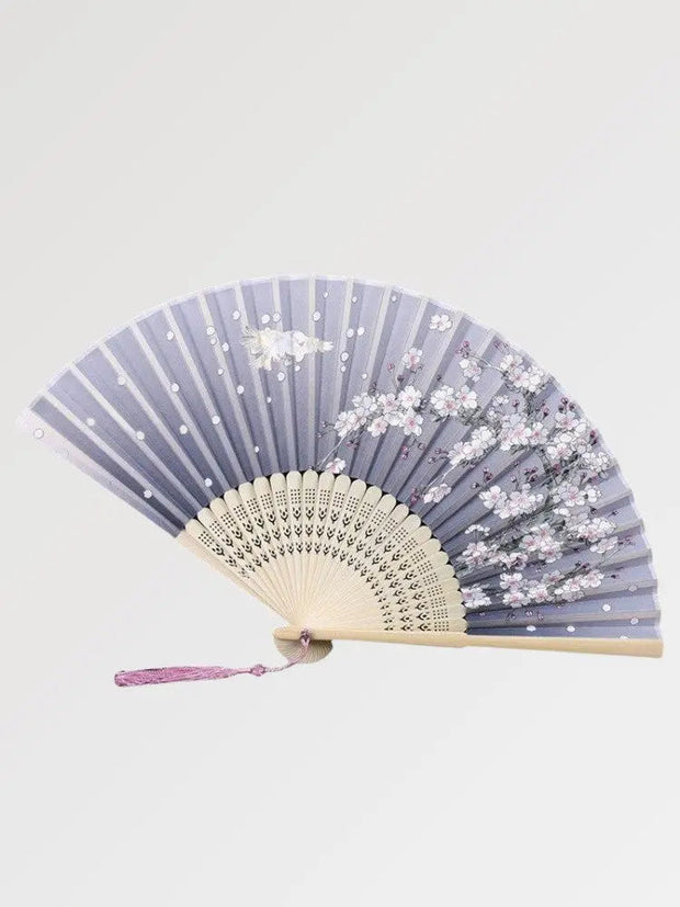 Japanese fan with lavender color and traditional pattern