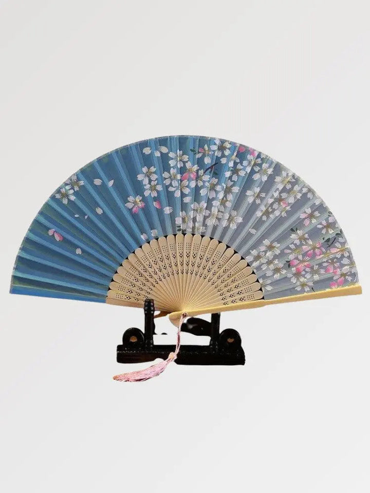 Beautiful blue Japanese wall fan with flowery pattern