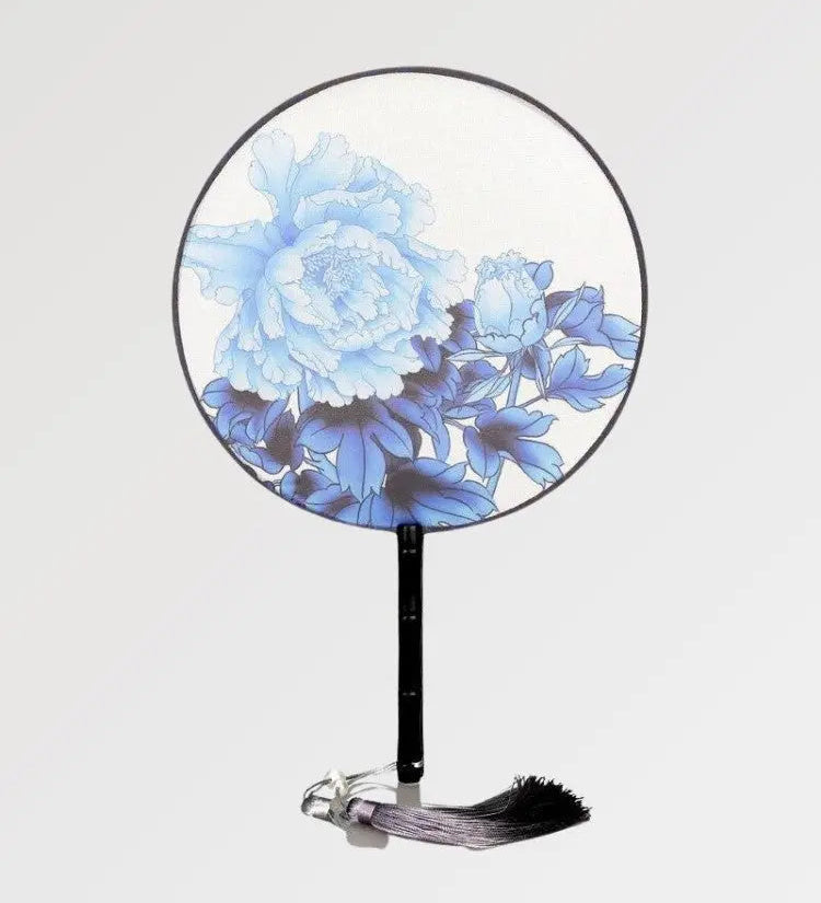 Elegant round japanese fan with flowery and bluish pattern