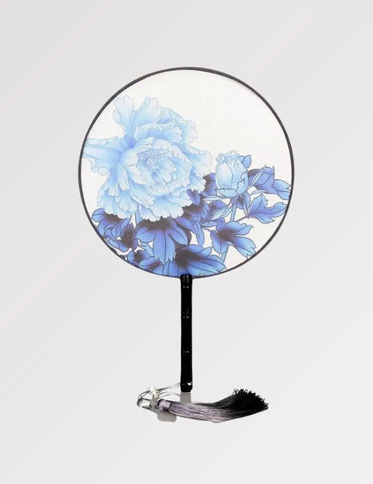 Elegant round japanese fan with flowery and bluish pattern
