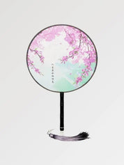 Detail view of japanese folding fan with sakura print - Sakura Tahara Round Japanese Fan