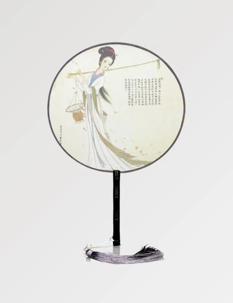 Beautiful traditional Japanese fan with bamboo structure and geisha design