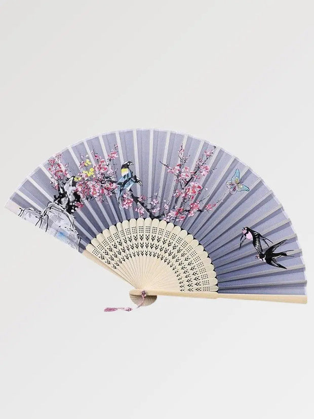 Japanese bamboo fan with iridescent flower and swallow pattern