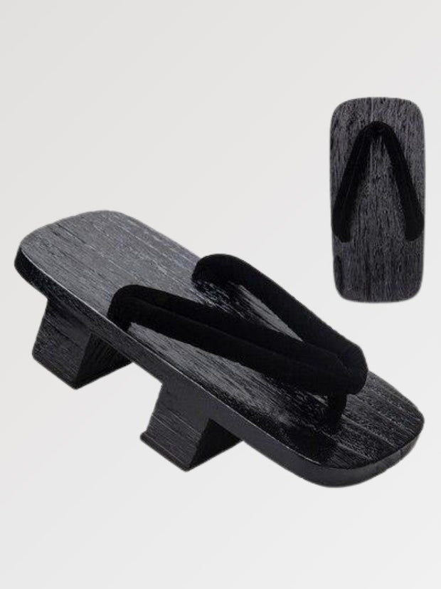 The pair of Japanese geta for men and women with black stained wood