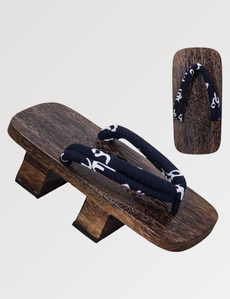 The traditional Japanese wooden sandal with its discreet patterned strap