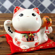 Back view of maneki neko figurine