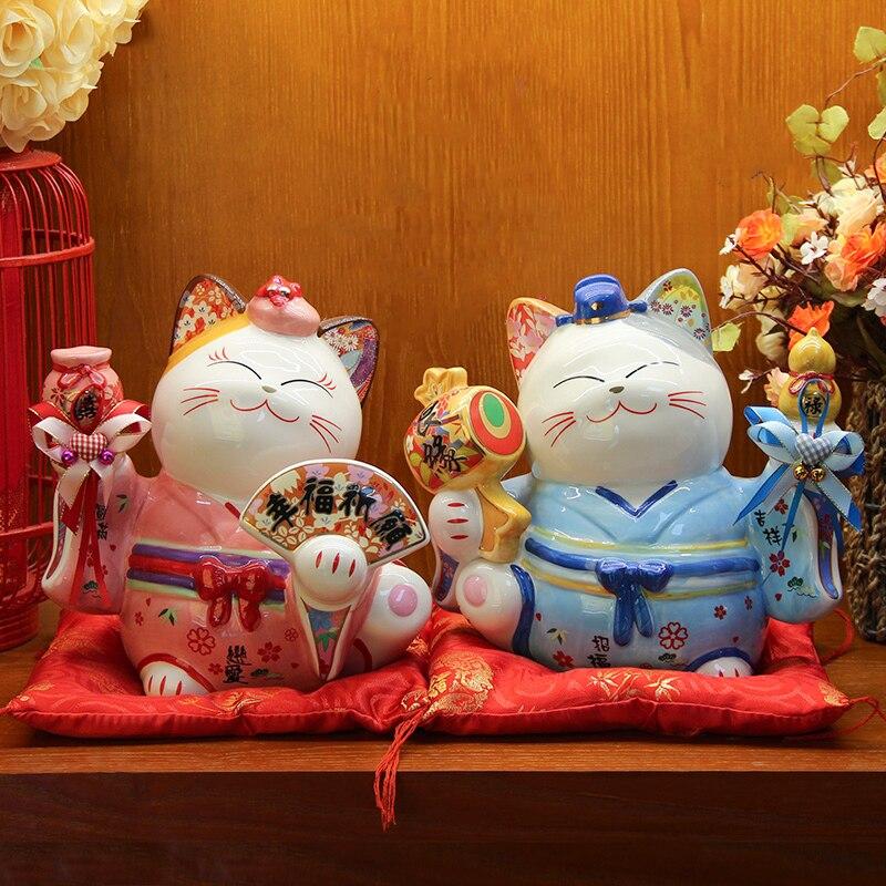 Back view of pink maneki neko figurine