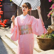 Elegant Japanese Women's Kimono in Pink with Gold Obi Belt