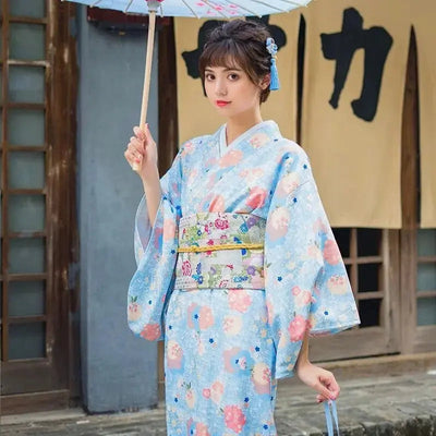 Traditional Japanese Kimono for Women in a sky blue color with cherry blossom prints