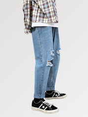 light blue ripped jeans means