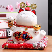 Back view of maneki neko figurine