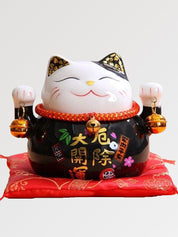 Japanese-style black maneki neko figurine
