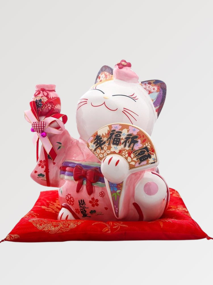 Japanese-style pink maneki neko figurine