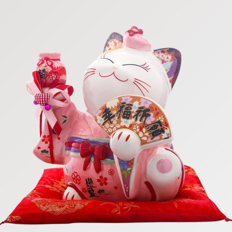 Japanese-style pink maneki neko figurine