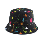 Detail of neon splash print on black bucket hat with string — Tokyo streetwear, arc'teryx bucket hat with string alternative