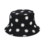 Detail of white daisy print on black cute bucket hat — Y2K Tokyo cotton, jacquemus floral bucket hat alternative
