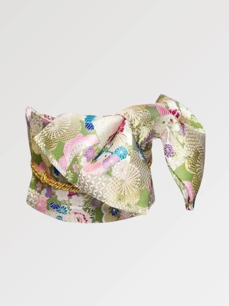 Pastel brocade obi belt with pink, green and blue flowers and gold thread, flat product view showing the full sash and knot