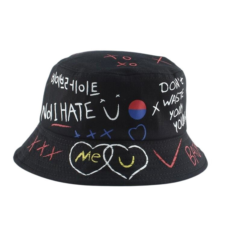 Detail of hand-drawn graffiti print on white cotton bucket hat — Seoul streetwear, jordan graffiti bucket hat alternative