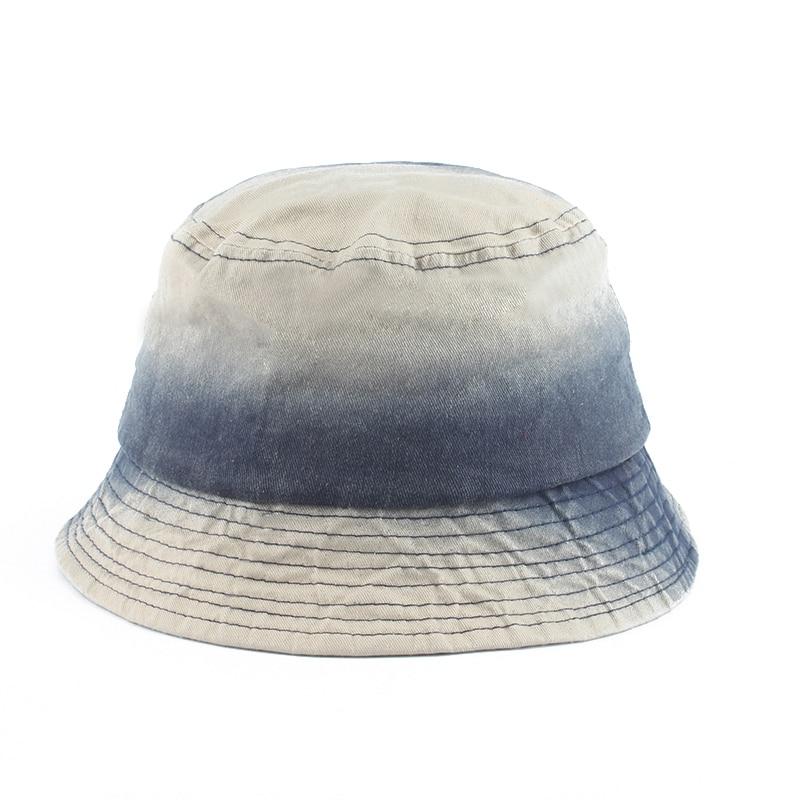 Detail of stonewashed indigo gradient on jean cotton bucket hat — Tokyo denim, evisu jean bucket hat alternative