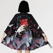 A lightweight kimono jacket for women with multiple japanese symbols