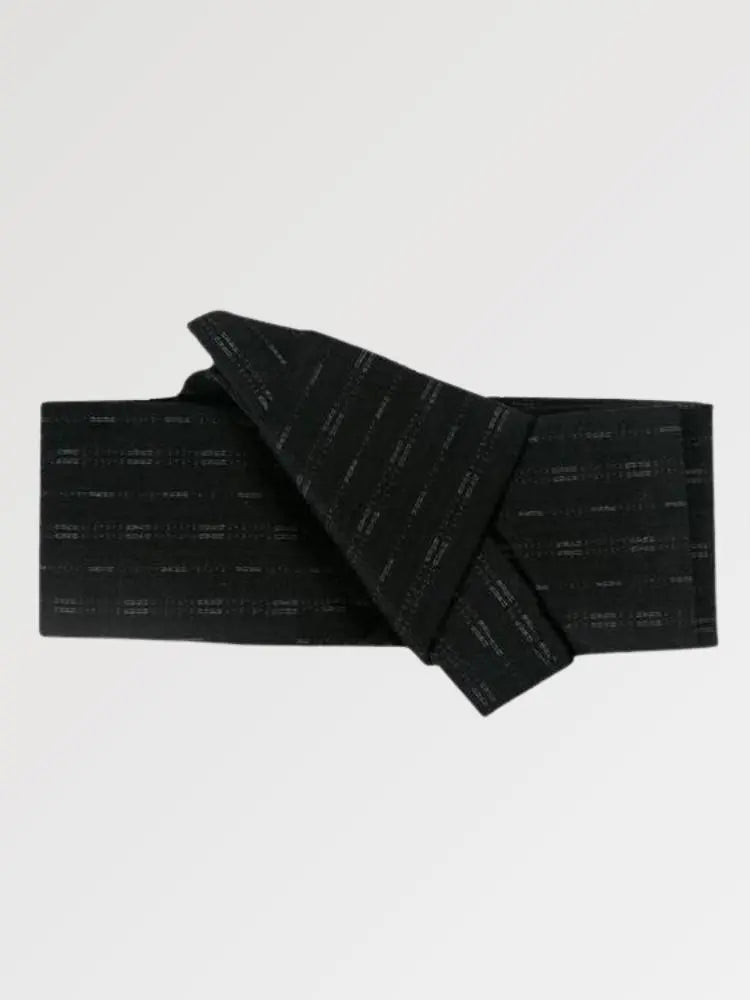 Solid black obi belt with a subtle tone-on-tone woven pattern, flat product view showing the full sash and knot