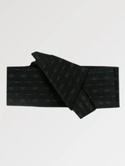 Solid black obi belt with a subtle tone-on-tone woven pattern, flat product view showing the full sash and knot