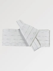 Off-white pale gray obi belt scattered with fine gray dashes, flat product view showing the full sash and knot
