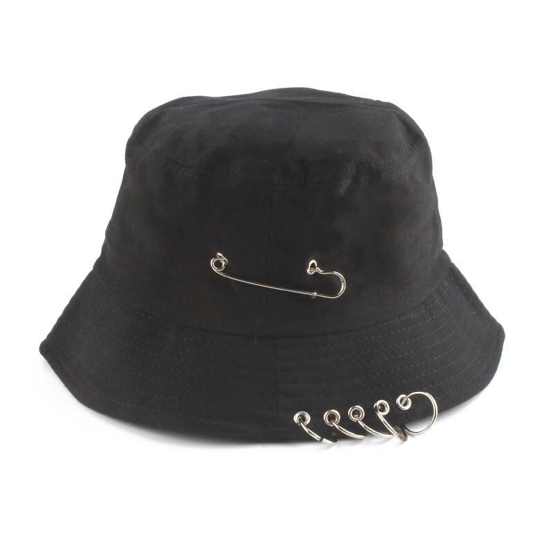 Detail of safety pin and rings on black punk bucket hat — Tokyo Harajuku punk, vivienne westwood punk bucket hat alternative
