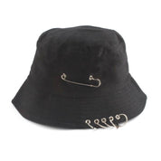 Detail of safety pin and rings on black punk bucket hat — Tokyo Harajuku punk, vivienne westwood punk bucket hat alternative