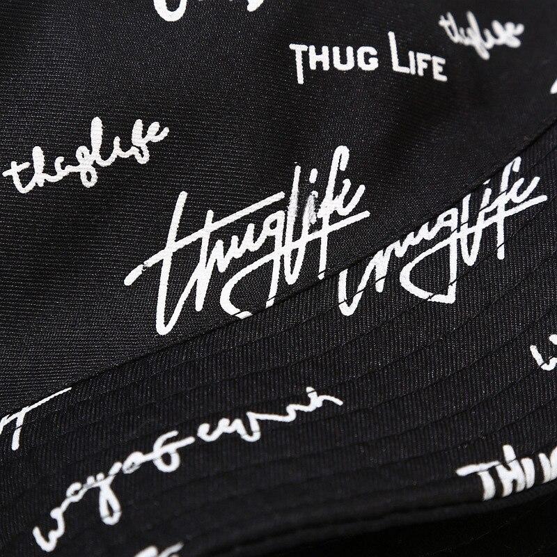 Side view of reversible bucket hat — black plain face, prada reversible bucket hat alternative