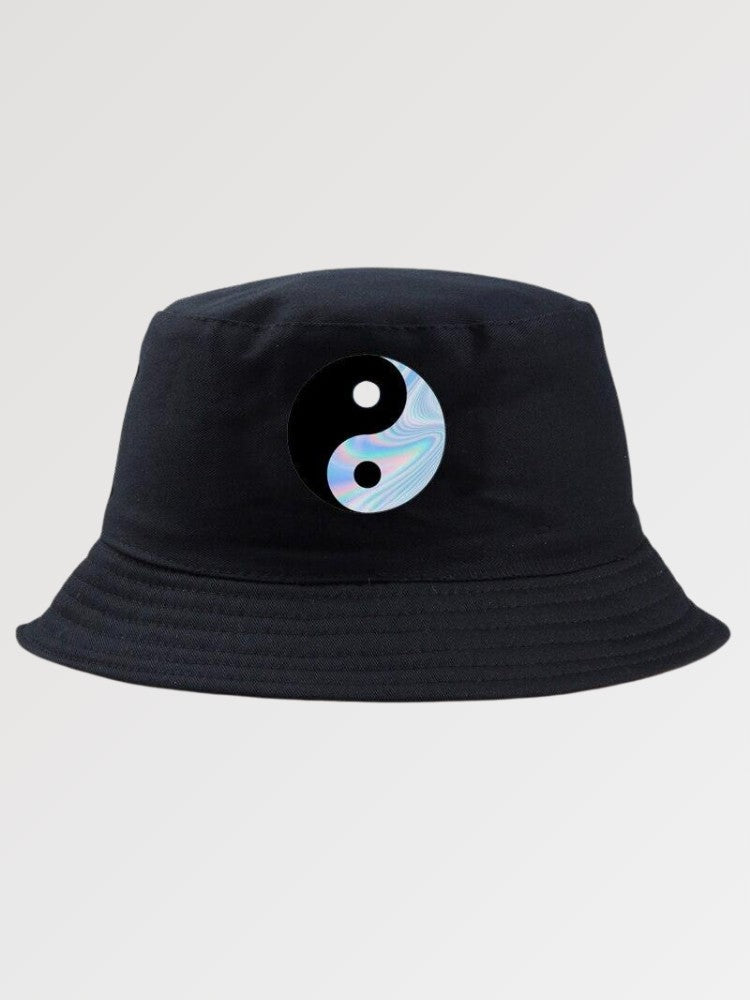 Black streetwear bucket hat with holographic yin yang patch — Y2K Tokyo aesthetic, supreme bucket hat alternative
