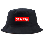 Detail of senpai red box logo on black bucket hat — Tokyo streetwear, supreme bucket hat alternative cotton