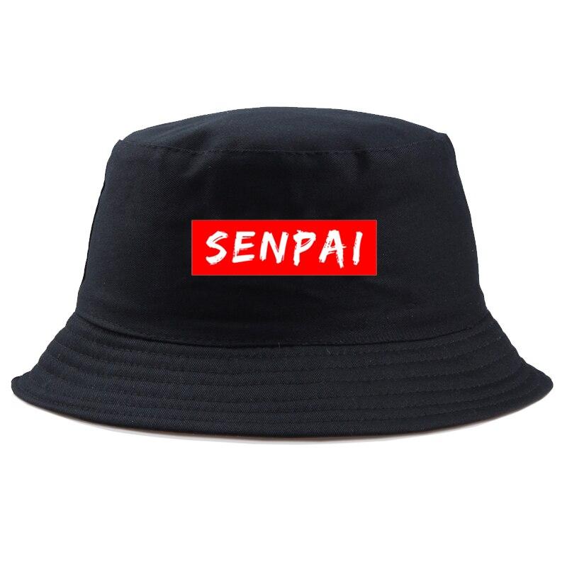 Detail of senpai red box logo on black bucket hat — Tokyo streetwear, supreme bucket hat alternative cotton