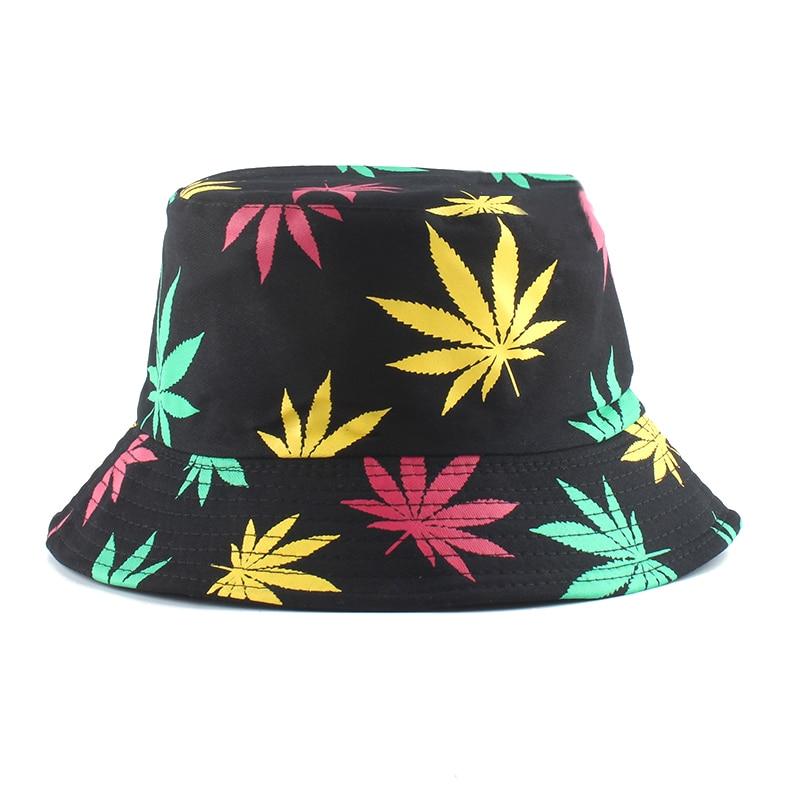 Detail of red yellow green rasta leaf print on black summer bucket hat — Tokyo streetwear, anthropologie summer bucket hat alternative