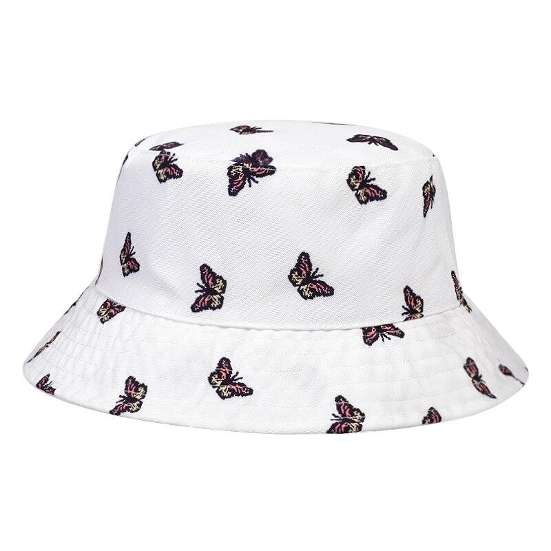 Detail of butterfly print on white cotton bucket hat — Y2K Harajuku, miu miu bucket hat alternative