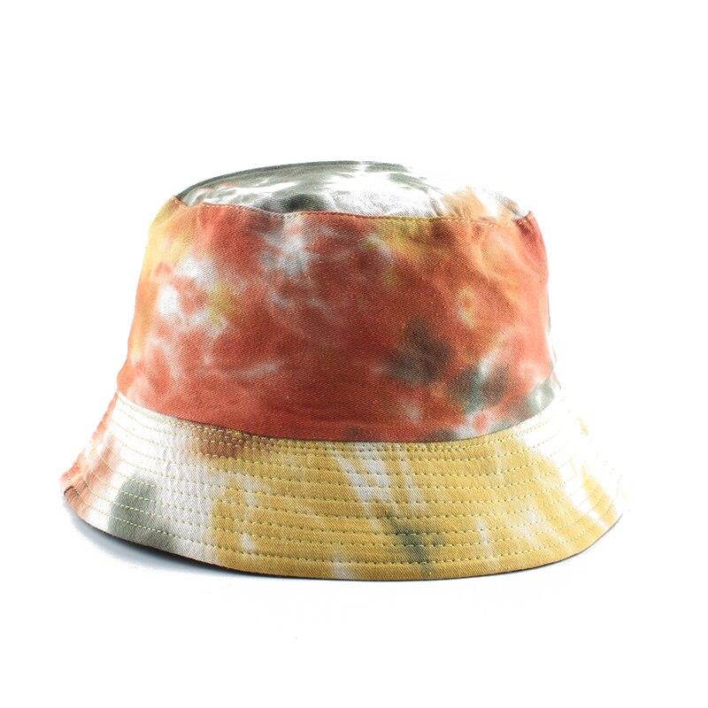 Detail of orange yellow tie-dye on yellow cotton bucket hat — Tokyo shibori, anthropologie tie dye bucket hat alternative
